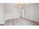 Bedroom features neutral paint, ceiling fan, and carpet at 909 Chapman Cir, Stone Mountain, GA 30088