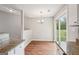 Open dining area with sliding doors to the backyard at 909 Chapman Cir, Stone Mountain, GA 30088