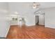 Spacious living room featuring hardwood floors, neutral paint and staircase at 909 Chapman Cir, Stone Mountain, GA 30088