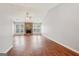 Spacious living room featuring a stone fireplace and many windows at 909 Chapman Cir, Stone Mountain, GA 30088