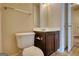 Simple bathroom featuring toilet, vanity with mirror, and tile floor at 117 Berkeley Way, Hampton, GA 30228