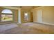 Bright and airy bedroom with large windows offering natural light and pleasant views at 117 Berkeley Way, Hampton, GA 30228