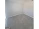 A bedroom with light gray carpeting, neutral walls, and a window with lots of natural light at 1354 Persimmon Ct, Lithonia, GA 30058