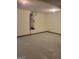 Spacious garage with epoxy floor, water heater, and white walls at 1354 Persimmon Ct, Lithonia, GA 30058