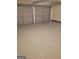 Spacious garage with epoxy floor, and two doors at 1354 Persimmon Ct, Lithonia, GA 30058