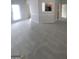 Open-concept living room with new carpeting, and seamless kitchen access at 1354 Persimmon Ct, Lithonia, GA 30058