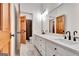 Bathroom with double vanity, white countertop, and modern fixtures at 504 Telfair Park, Peachtree City, GA 30269