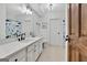 Bathroom with white vanity, large mirror and custom designed shower curtain at 504 Telfair Park, Peachtree City, GA 30269