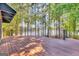 Spacious wooden deck perfect for outdoor entertaining offers scenic waterfront views at 504 Telfair Park, Peachtree City, GA 30269