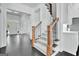 Welcoming foyer with staircase, hardwood floors, and natural light at 504 Telfair Park, Peachtree City, GA 30269