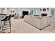 Open-concept living space with a fireplace and cozy seating at 504 Telfair Park, Peachtree City, GA 30269
