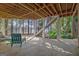 Outdoor patio with lake view, featuring stairs and lush greenery at 504 Telfair Park, Peachtree City, GA 30269