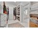 Well-organized walk-in closet with ample storage and access to the bathroom at 504 Telfair Park, Peachtree City, GA 30269