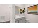 Well-lit bathroom featuring a modern vanity, toilet, and stylish decor at 566 Silver Moon Drive # 21, Loganville, GA 30052