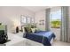Charming bedroom with natural light, a soccer theme, and a view of the outdoors at 566 Silver Moon Drive # 21, Loganville, GA 30052