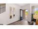 Welcoming foyer features wood floors, a stylish entryway, and plenty of natural light creating a warm and inviting atmosphere at 566 Silver Moon Drive # 21, Loganville, GA 30052
