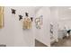 Hallway entrance featuring decorative wall hooks and modern wall art decor at 566 Silver Moon Drive # 21, Loganville, GA 30052