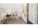 Open-concept kitchen features white cabinets, stainless appliances, and a center island with counter seating at 566 Silver Moon Drive # 21, Loganville, GA 30052