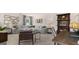 Inviting living room features a comfortable sectional sofa, stylish decor, and a well-lit workspace at 566 Silver Moon Drive # 21, Loganville, GA 30052