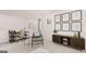Bright living space with a functional desk area, stylish decor, and comfortable seating, ideal for both work and relaxation at 566 Silver Moon Drive # 21, Loganville, GA 30052