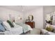 Bright main bedroom with neutral walls, stylish decor, and a comfortable sitting area at 566 Silver Moon Drive # 21, Loganville, GA 30052