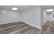 Finished basement featuring laminate flooring and neutral walls at 935 Amelia Rd, Locust Grove, GA 30248