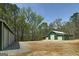 A beautiful farm featuring multiple garages and plenty of land at 935 Amelia Rd, Locust Grove, GA 30248