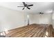 Spacious bedroom with hardwood floors, ceiling fans, and lots of natural light at 1146 Redan Way, Stone Mountain, GA 30088
