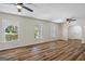 Bright and airy living room with hardwood floors, ceiling fans and white trim at 1146 Redan Way, Stone Mountain, GA 30088