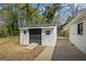 Exterior view of the utility shed and backyard of home, offering ample space and additional storage at 1146 Redan Way, Stone Mountain, GA 30088