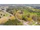 Aerial view of the property and the surrounding wooded area at 1407 Highway 92 N, Fayetteville, GA 30214