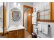 Inviting bathroom featuring modern fixtures, a stylish mirror, and ample towel storage at 1407 Highway 92 N, Fayetteville, GA 30214