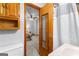 View into bedroom from a compact bathroom featuring a classic vanity and shower at 1407 Highway 92 N, Fayetteville, GA 30214
