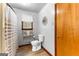 Bathroom with white toilet and shower with modern fixtures at 1407 Highway 92 N, Fayetteville, GA 30214