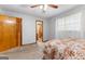 Bright bedroom featuring a closet, a window with curtains, and carpet flooring at 1407 Highway 92 N, Fayetteville, GA 30214