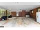 Spacious carport featuring a brick wall and a hot tub in the corner at 1407 Highway 92 N, Fayetteville, GA 30214