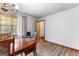 Dining room showcasing wooden table set, neutral colored walls, and vinyl flooring at 1407 Highway 92 N, Fayetteville, GA 30214
