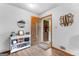 Inviting foyer with decor, wood-look floors and a decorative glass front door at 1407 Highway 92 N, Fayetteville, GA 30214