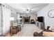 Bright and airy living room featuring a cozy fireplace, large TV, and comfortable seating at 1407 Highway 92 N, Fayetteville, GA 30214