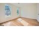 Bright, empty bedroom with hardwood floors and lots of natural light at 2069 Sandtown Sw Rd, Atlanta, GA 30311