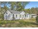 Charming single-story home featuring a well-maintained lawn and inviting front porch at 2069 Sandtown Sw Rd, Atlanta, GA 30311