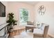 Cozy living room with natural light, neutral colors, and comfortable seating at 2069 Sandtown Sw Rd, Atlanta, GA 30311