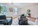 Bright living room featuring hardwood floors, stylish furnishings, and natural light at 2069 Sandtown Sw Rd, Atlanta, GA 30311