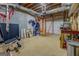 Unfinished basement space with exposed ceiling and ready for customization at 1744 Elks Club Rd, Covington, GA 30014