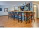 Basement bar area featuring seating, stylish decor, and space for entertaining at 1744 Elks Club Rd, Covington, GA 30014