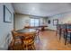 Basement game room featuring a card table, shuffleboard, and bar with seating at 1744 Elks Club Rd, Covington, GA 30014