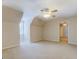 Spacious bedroom featuring a ceiling fan and natural light from the window at 1744 Elks Club Rd, Covington, GA 30014