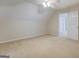 Bedroom with neutral carpeting and ceiling fan at 1744 Elks Club Rd, Covington, GA 30014