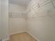 Walk-in closet with wire shelving providing organized storage at 1744 Elks Club Rd, Covington, GA 30014