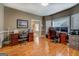 Spacious office featuring hardwood floors, dual desks, and bright windows for a productive workspace at 1744 Elks Club Rd, Covington, GA 30014